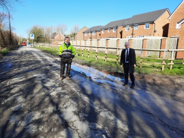 Coun Bobby Rigby and Mark Menzies MP on Cropper Road